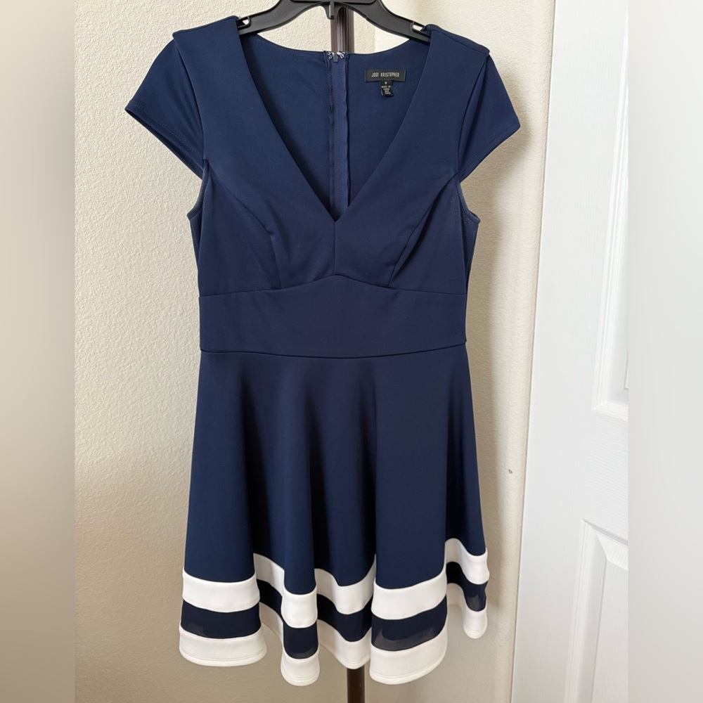 Elegant Navy Blue Dress with White Accents